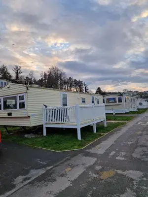 a row of rvs parked on the side of a road at Brynowen Holiday Park Borth in Borth