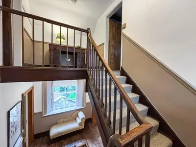 an overhead view of a staircase in a house at Manor Farmhouse in Church Stretton