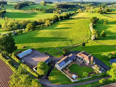 an aerial view of a large house in a field at 3 Bed in Lyonshall oc-h34806 in Lyonshall