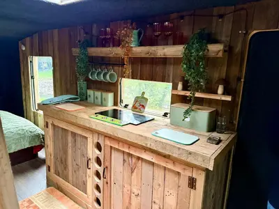 a wooden counter in a room with a bed at Nesta's Nook in Llandovery