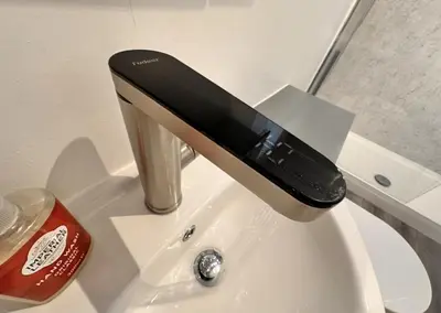 a faucet on a sink in a bathroom at Pet friendly 3 bed retreat for beach, castle, golf in Harlech