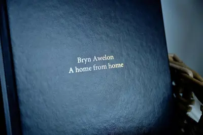 a book with the words buy a home from home at Finest Retreats - Bryn Awelon in Harlech