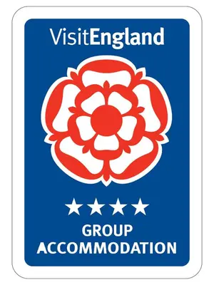 a sign for the vietnam island group association with a red flower at Ludlow Mascall Centre in Ludlow