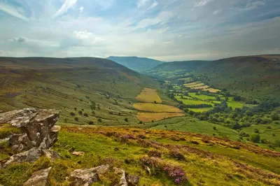 a view of a valley in the hills at Brynderwen Barn in Llangorse