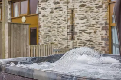 a water fountain in front of a building at 4 Bed in Builth Wells oc-39461 in Builth Wells