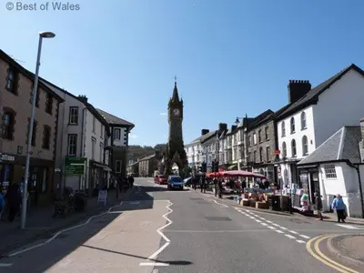 a street in a town with a clock tower at 2 Bed in Aberdyfi oc-78258 in Pennal