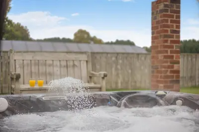 a person is spraying water into a water fountain at 4 Bed in Builth Wells oc-39473 in Builth Wells