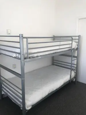 a couple of bunk beds in a room at The Sandpiper in Barmouth