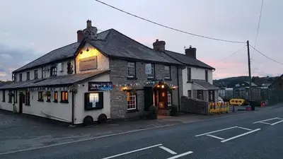 a building sitting on the side of a street at New Gurkha Inn in Brecon