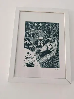 a framed picture of a painting at Hazler Lodge guest house in Church Stretton
