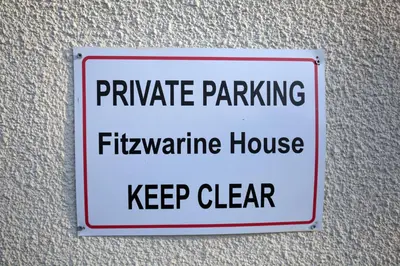 a sign that reads private parking firemite house keep clear at Fitzwarine House Whittington in Whittington