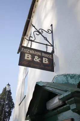 a sign on the side of a building at Fitzwarine House Whittington in Whittington