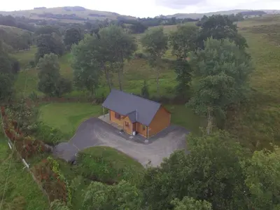 an overhead view of a house in a field at LLanddewi Retreat in Llanddewi Ystradenny