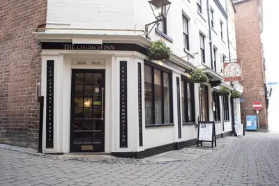 a building on the side of a street at Church Inn in Ludlow