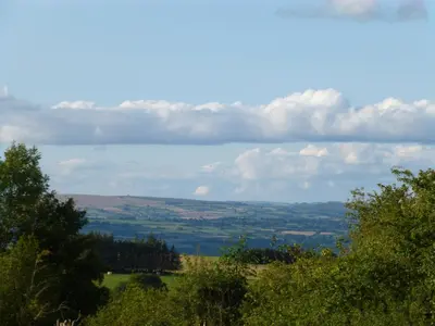 a view from the top of a hill with trees at Hay-on-Hye retreat in Hay-on-Wye