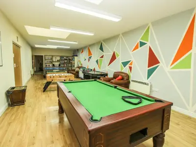 a room with a pool table in a room at The Wain House in Acton Scott