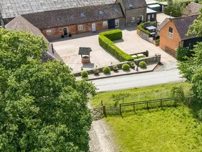 an aerial view of the courtyard of a house at The Olde Cowshed in Acton Scott