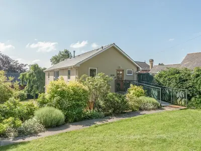 a house with a garden in front of it at The Schoolhouse Brewhouse in Bishops Castle