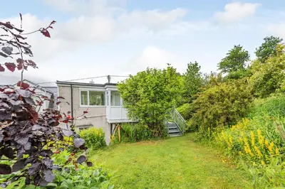 a house on a hill with a garden at Penty in Dolgellau