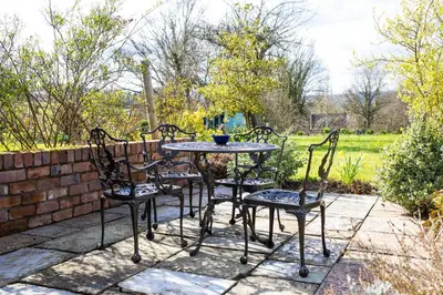 a table and chairs sitting on a patio at Stargazer's Loft in Clifford