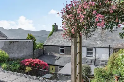 a view from the roof of a house with flowers at 2 Bryn Tirion in Tanygrisiau