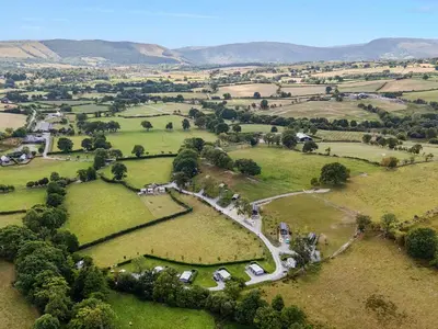 an aerial view of a field with tents in it at Caban Nant Ddu in Nantmel