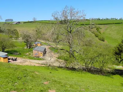 an aerial view of a house in a field at Rolling Hills in Newcastle