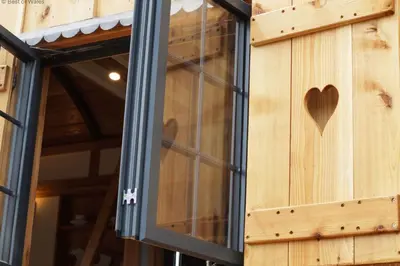 a window with a heart on the side of a building at Flying Scotsman in Cray