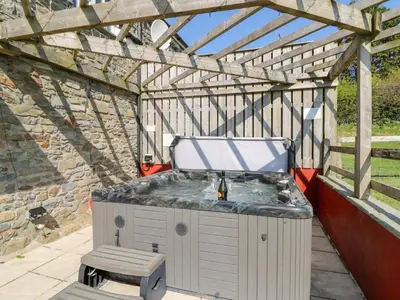 a jacuzziificialificialificialificialificialificialificialificialificialificialificial at Mill Cottage in Ciliau-Aeron