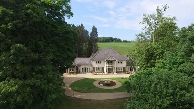 an aerial view of a large house with a yard at Plas Y Dderwen Bed and Breakfast in Aberystwyth