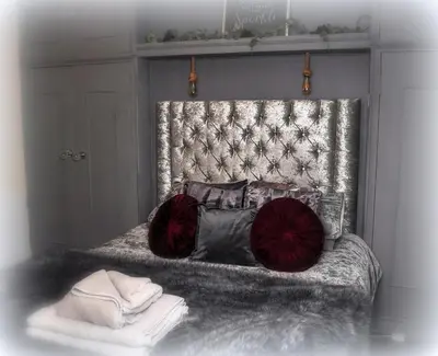 a drawing of a bed with two pillows on it at Peniarth arms in Llanegryn
