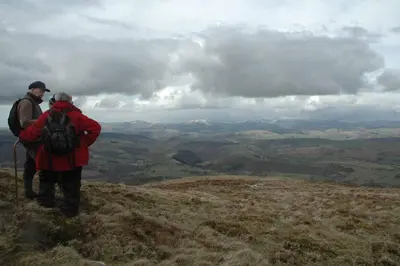 two people standing on the top of a hill at Mid Wales Arts B&B in Caersws