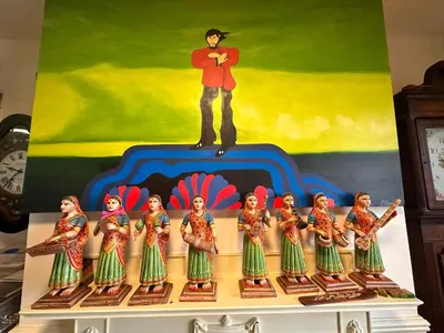 a figurine of a man standing on top of a group of women at Green Dragon LUDLOW in Ludlow
