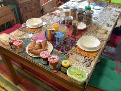 a table with croissants and other food on it at Green Dragon LUDLOW in Ludlow