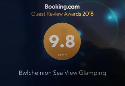 a screenshot of a sign for a guest review awards at Bwlcheinion Sea View Glamping in Machynlleth