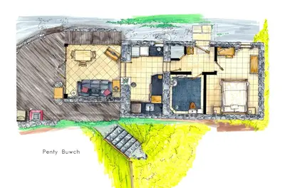 a plan of a house with a roof at Beautiful Wales in Barmouth