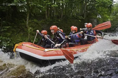 a group of people in a raft in the water at 3 Bed in Bala oc-bow26 in Llanuwchllyn