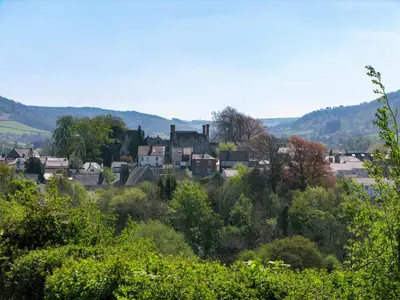 a small town in the mountains with trees at Seven Stars in Hay-on-Wye