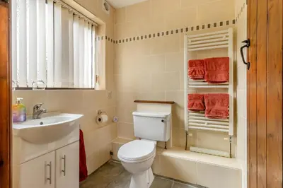 a bathroom with a toilet and a sink at 2 Bed in Caersws oc-waa322 in Trefeglwys