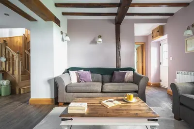 a living room with a couch and a coffee table at 3 Bed in Llangadfan oc-wae284 in Llangadfan