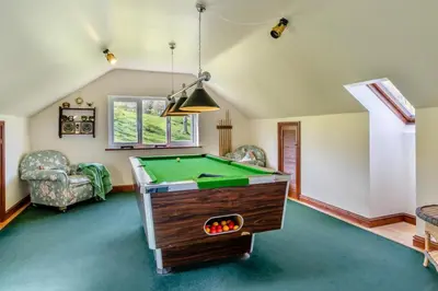 a living room with a pool table in it at 2 Bed in Caersws oc-waa345 in Trefeglwys