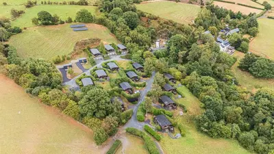 an aerial view of an estate with a group of homes at Glanyrafon in Rhayader