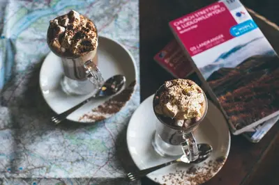a couple of spoons with chocolate ice cream on a plate at Rowton Castle in Shrewsbury