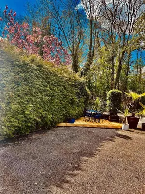 a group of benches sitting in a park at Rooms at The Usk in Talybont