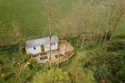 an aerial view of a house in a field at Llethrau Forest & Nature Retreats in Knighton