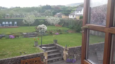 a view of a garden from a window at The Granary in Talgarth