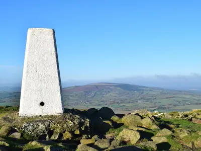 a stone lighthouse on top of a mountain at Shepherds Cabin at Titterstone in Farden