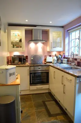 a kitchen with a sink and a stove at 19 Upper Linney in Ludlow