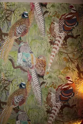 a painting of pheasants sitting on a tree branch at Plas Esgair in Llanbrynmair