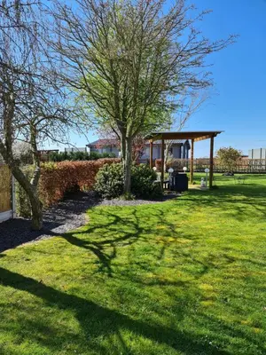 a tree in a yard with a gazebo at Ruth's Retreat Beautiful Country Retreat with private hot tub & wonderful views in Shrewsbury